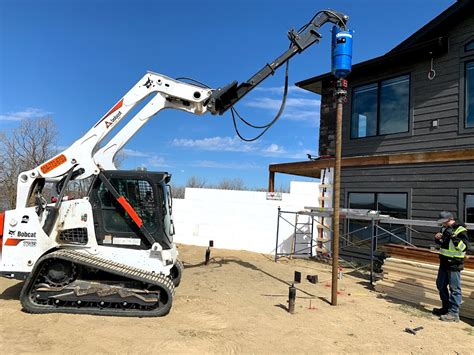 skid steer pile drivers|bobcat screw pile attachment.